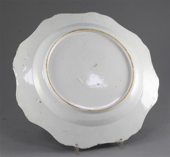 A Chinese famille rose petal lobed dish, Qianlong period, diameter 31.5cm, hairline crack